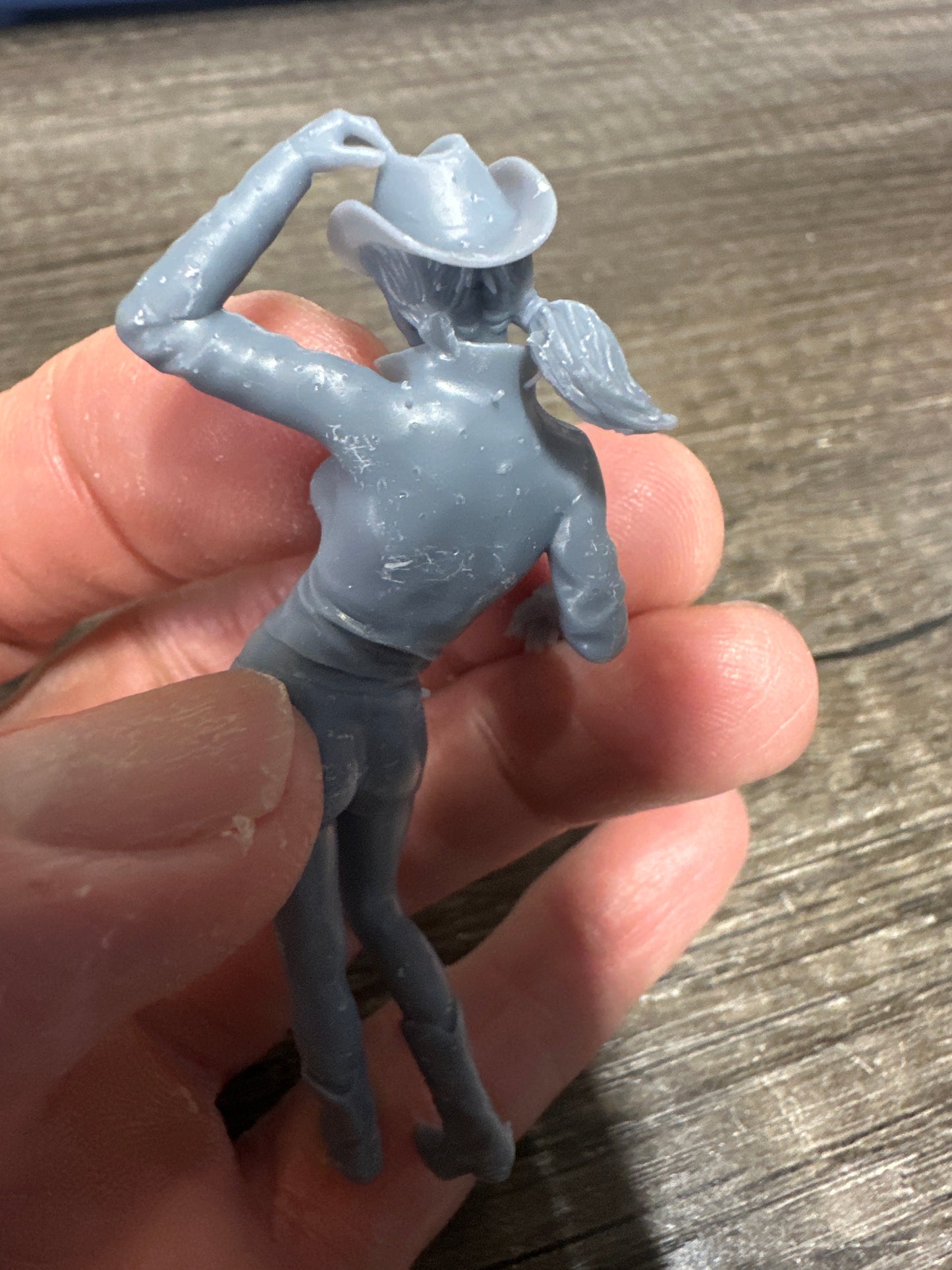 1/25 leaning cowgirl