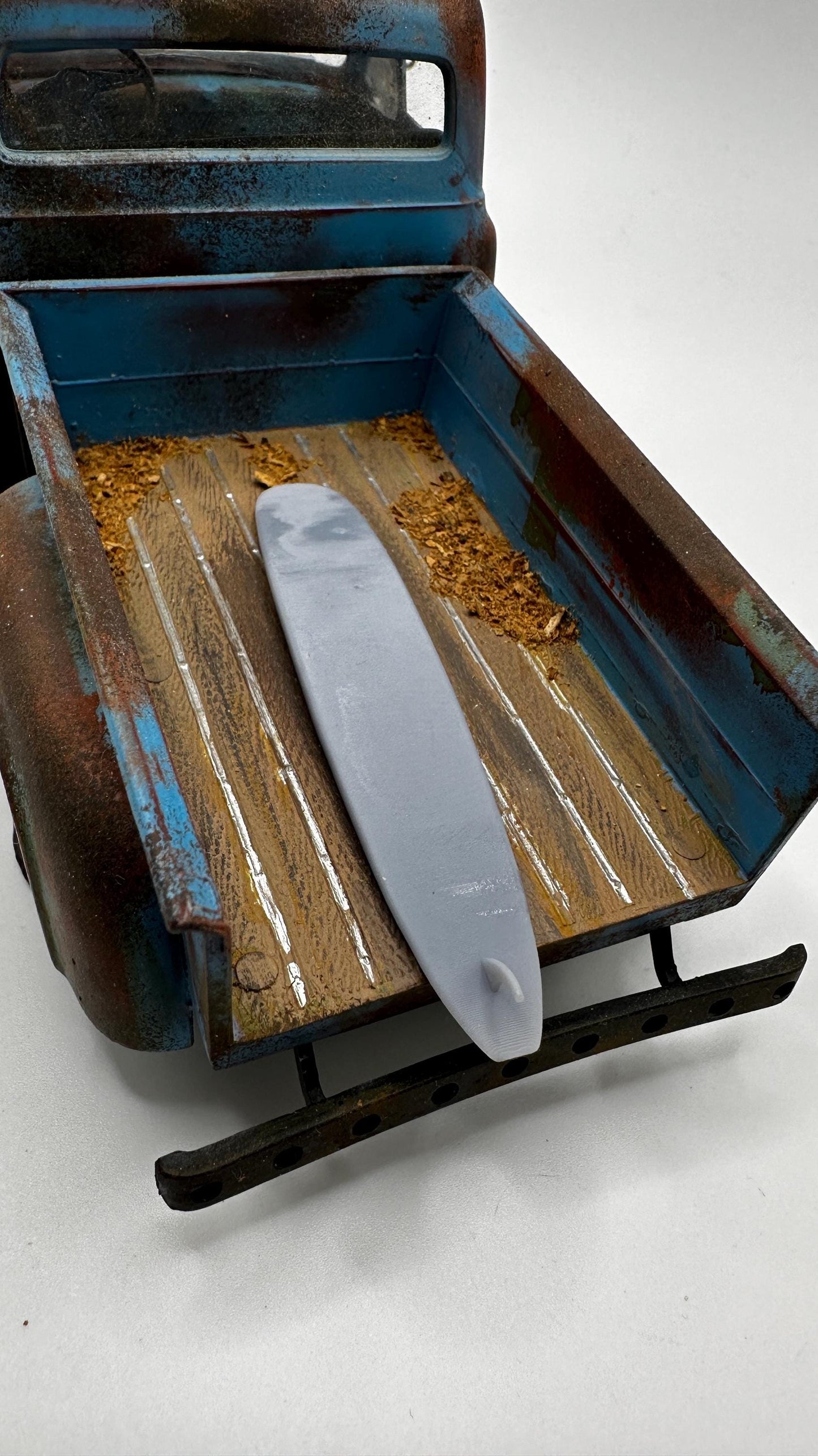 1/25 scale surf and turf special. Two surfboards and one skateboard. 3-D printed.