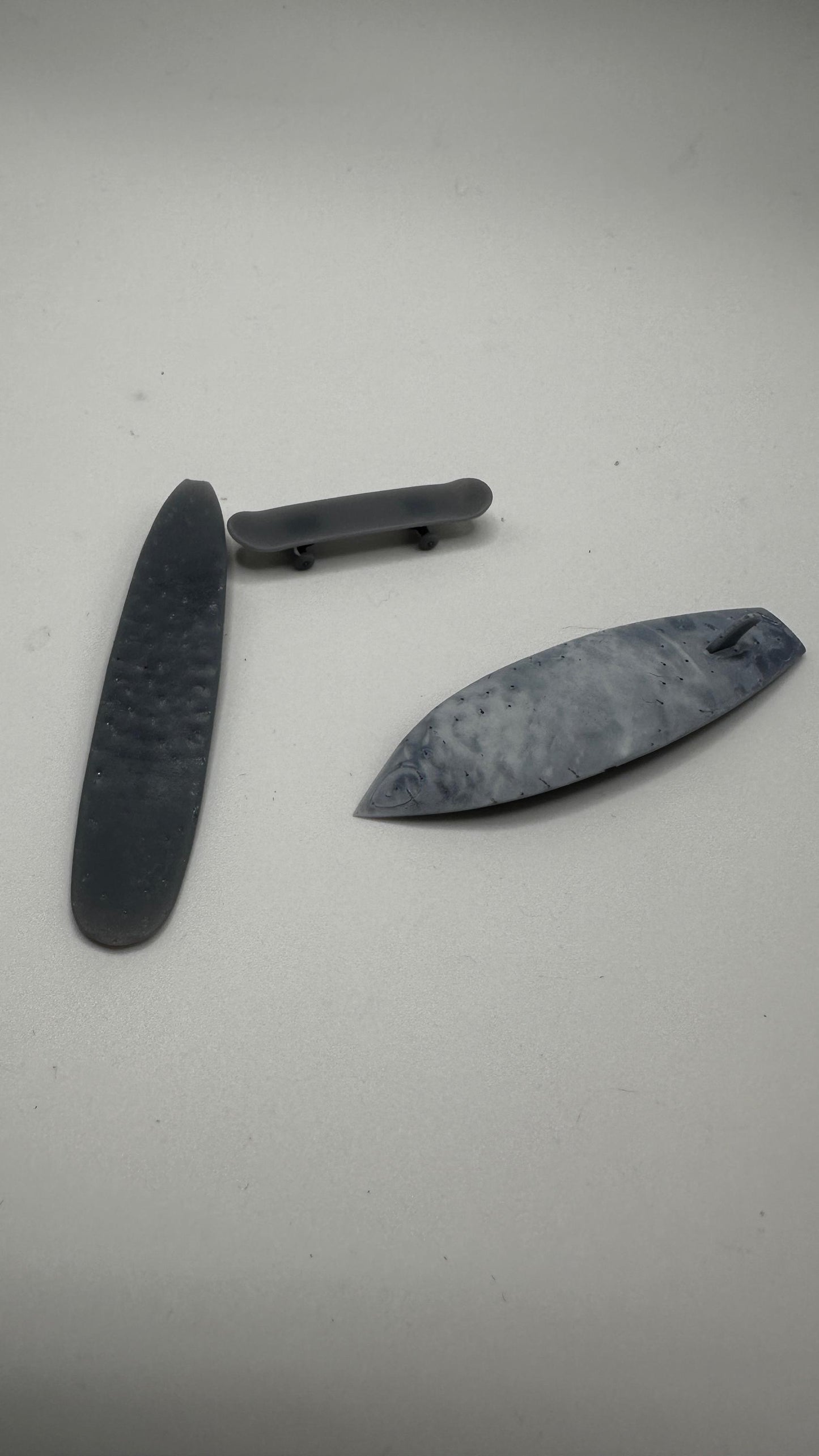 1/25 scale surf and turf special. Two surfboards and one skateboard. 3-D printed.