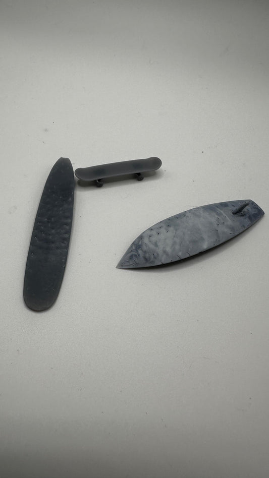 1/25 scale surf and turf special. Two surfboards and one skateboard. 3-D printed.